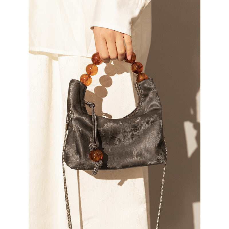 Elegant Genuine Leather Dumpling Bag with Beaded Handle