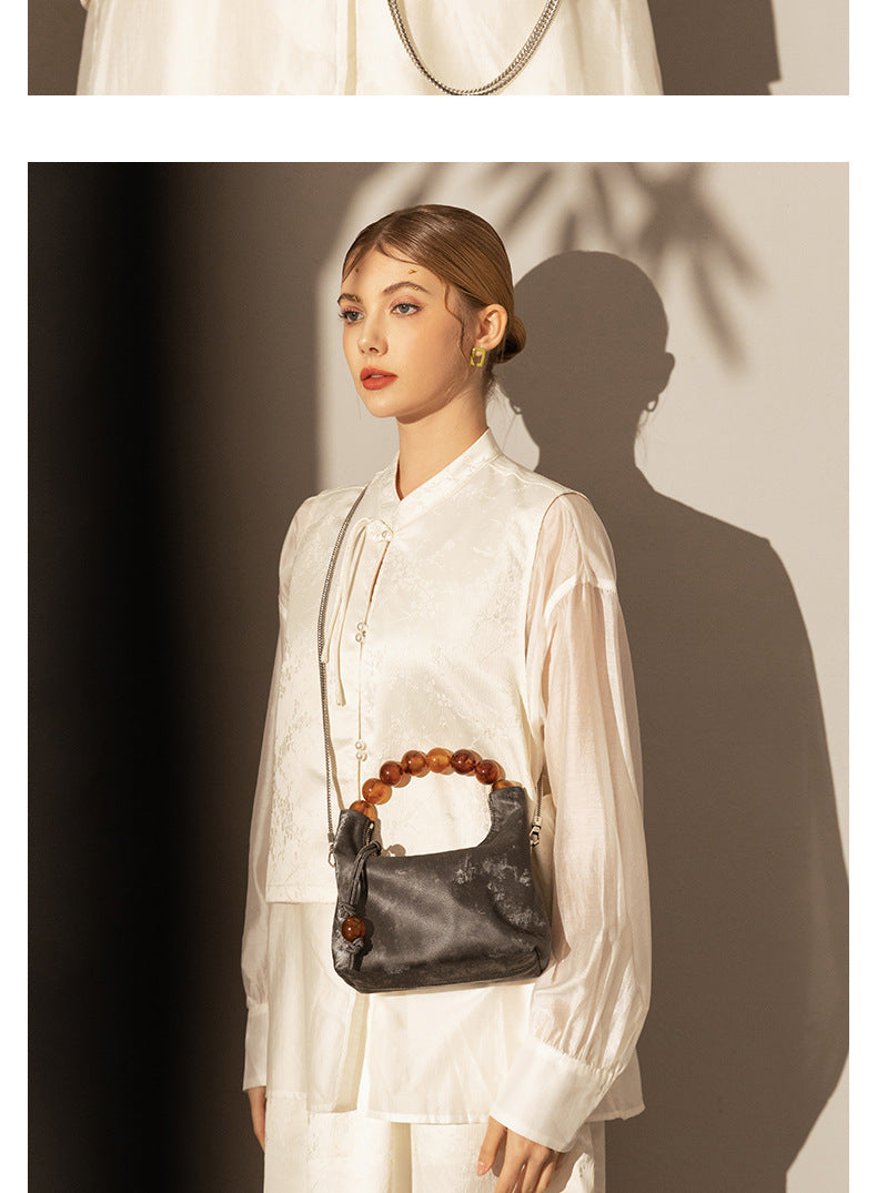 Elegant Genuine Leather Dumpling Bag with Beaded Handle