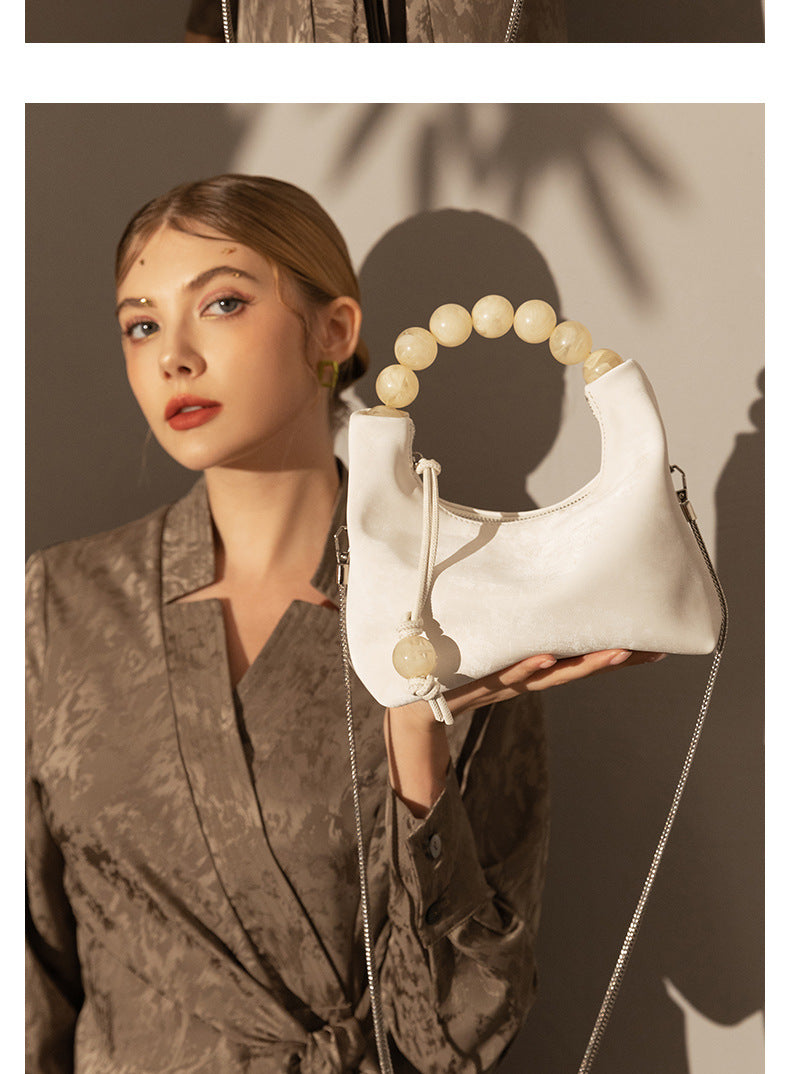 Elegant Genuine Leather Dumpling Bag with Beaded Handle