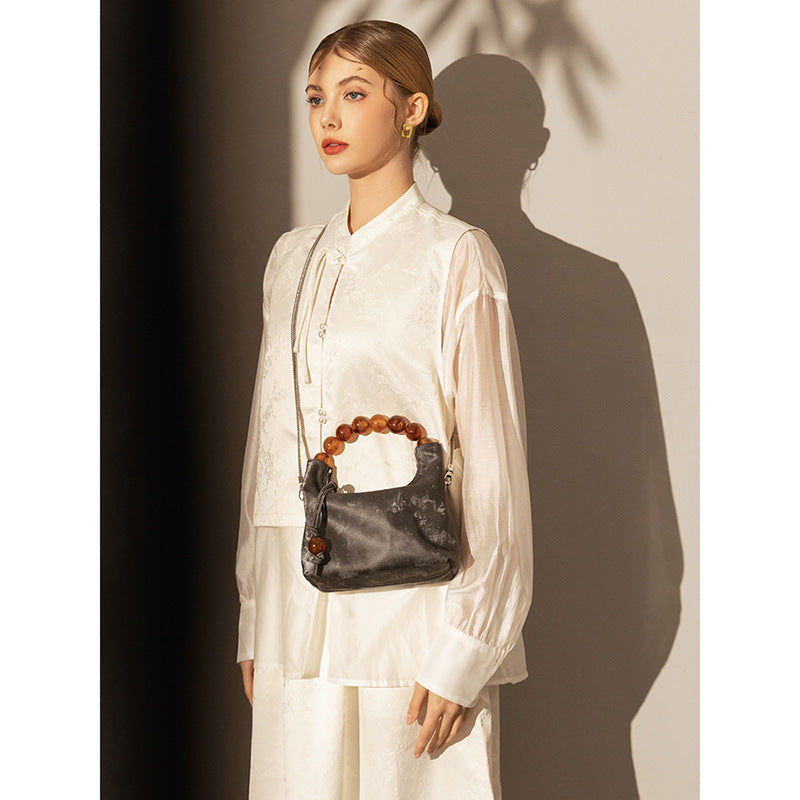 Elegant Genuine Leather Dumpling Bag with Beaded Handle